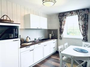 F-1112 Ferienwohnung Lobbe FeWo 03 strandnah, Garten