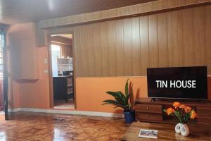 Welcome to our Tin House!