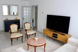 Appartements Appartement chaleureux en centre-ville : photos des chambres