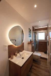 Appartements En plein centre du village ! : photos des chambres