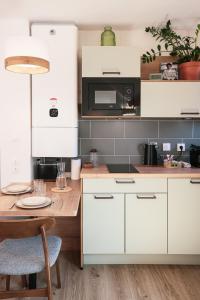 Appartements En plein centre du village ! : photos des chambres