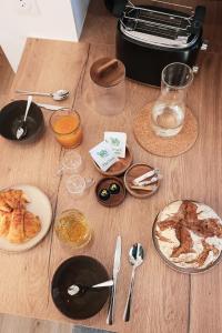 Appartements En plein centre du village ! : photos des chambres