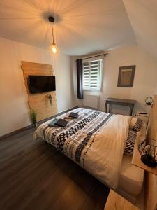 Appartements L'ecluse des Fontinettes, maison de ville atypique : photos des chambres
