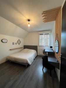 Appartements L'ecluse des Fontinettes, maison de ville atypique : photos des chambres