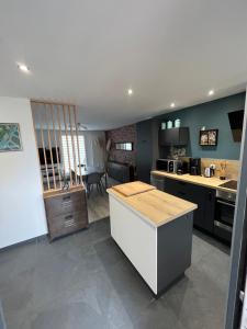 Appartements L'ecluse des Fontinettes, maison de ville atypique : photos des chambres