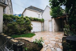 Maisons de vacances L-Ecrin - Stationnement Privatif - Coeur de ville : photos des chambres