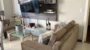 DEPARTAMENTO PREMIUM ! FRENTE PLAZA PRINCIPAL!! Con parrilla y balcón y cochera para auto o camioneta