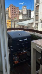 DEPARTAMENTO PREMIUM ! FRENTE PLAZA PRINCIPAL!! Con parrilla y balcón y cochera para auto o camioneta