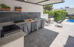 Three-Bedroom Holiday Home In Banjole