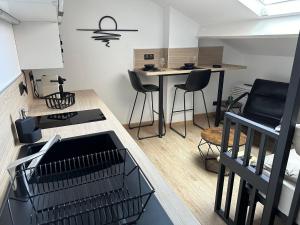 Appartements Le Studio Bellifontain : photos des chambres