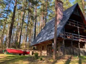 Ferienhaus Marianna am See mit gratis Sauna, Ruderboot & WLAN - Łajs