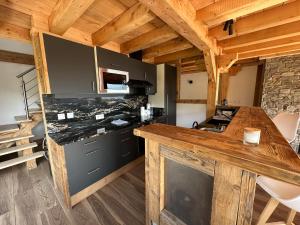 Appartements Chalet vue Mont Blanc avec jacuzzi exterieur : photos des chambres