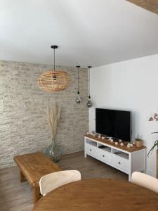 Appartements Le Garden Champ-- Duplex, jardin : photos des chambres