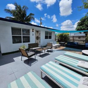 Prime Location Gateway with Pool & Patios, Near Beaches, Groceries and Restaurants