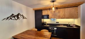 Appartements Appartement cosy - proche des pistes : photos des chambres