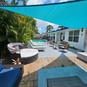 Prime Location Gateway with Pool & Patios, Near Beaches, Groceries and Restaurants