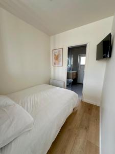 Appartements Charmant Studio a Saint Leonard : photos des chambres