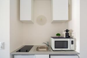 Appartements Le Peruvien - Saint-Cyr-L-Ecole - Free Parking : photos des chambres