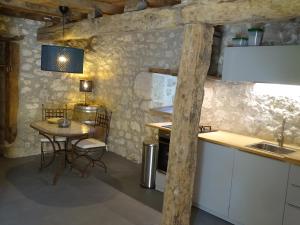 Appartements Cave Le Vieux Manoir : photos des chambres