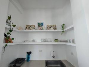 Absolute Beachfront Studio with Kitchen & Balcony