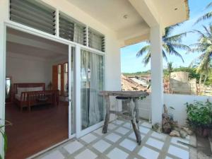 Absolute Beachfront Studio with Kitchen & Balcony