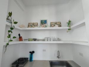 Absolute Beachfront Studio with Kitchen & Balcony