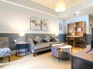 Cozy Designed 2BR with Working Room at Meikarta Apartment By Travelio