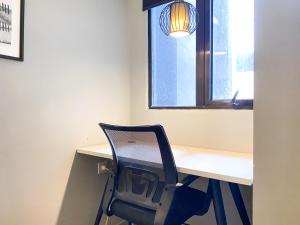 Cozy Designed 2BR with Working Room at Meikarta Apartment By Travelio