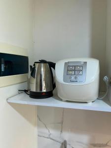 Homey Stay Studio at Pollux Chadstone Apartment By Travelio