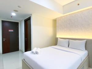 Homey Studio at Pollux Chadstone Apartment By Travelio