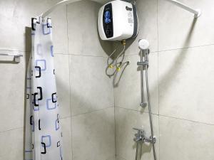 Homey Studio at Pollux Chadstone Apartment By Travelio