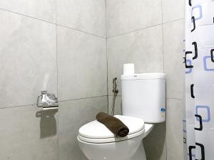 Homey Studio at Pollux Chadstone Apartment By Travelio