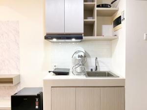 Homey Studio at Pollux Chadstone Apartment By Travelio