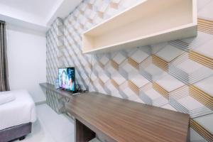 Good Deal and Homey Studio Azalea Suites Apartment Cikarang By Travelio