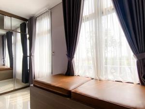 Modern and Comfy Studio at Pollux Chadstone Apartment By Travelio