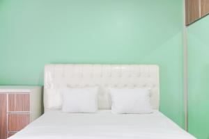 Comfort Living and Homey Studio Signature Park Grande Apartment By Travelio