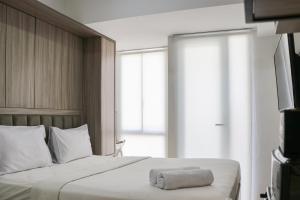 Homey Designed and Tidy Studio Tokyo Riverside PIK 2 Apartment By Travelio