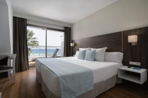 Junior Suite Sea View  room in Alua Golf Trinidad