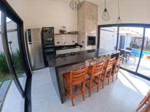 Palmeiras-Izi cpiscina aquecida vista para o mar