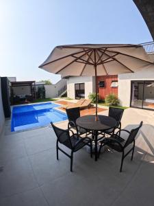 Palmeiras-Izi cpiscina aquecida vista para o mar