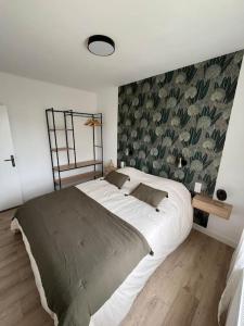 Maisons de vacances Le haut du jardin : photos des chambres