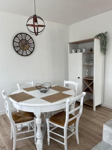 Maisons de vacances Le haut du jardin : photos des chambres