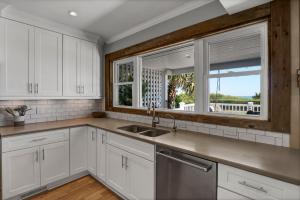 Blue Wave Retreat by Sea Scape Properties