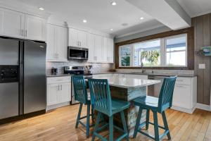 Blue Wave Retreat by Sea Scape Properties