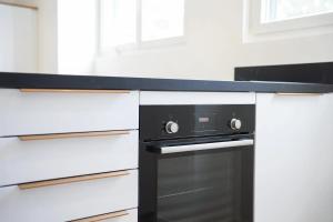 Appartements Le Raffine LOUSTAL-OC TARBES PYRENEES : photos des chambres