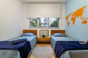 Novo. Vista Lateral para a Praia, 2 ou 3 quartos, wi fi, cozinha completa e ar.