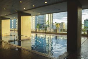 Stylish 1BR Near US Embassy & Luneta with Pool & Gym