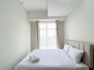 Cozy Stay 1BR at Vasanta Innopark Apartment By Travelio - 3hvězdičkové hotely ve městě Cikarang