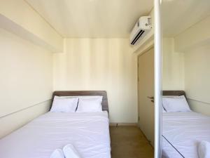 Homey and Minimalist 2BR at Meikarta Apartment By Travelio - 3hvězdičkové hotely ve městě Cikarang
