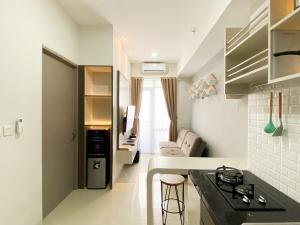 Comfort Stay 1BR at Vasanta Innopark Apartment By Travelio